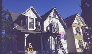 Pulling vinyl off a Victorian house