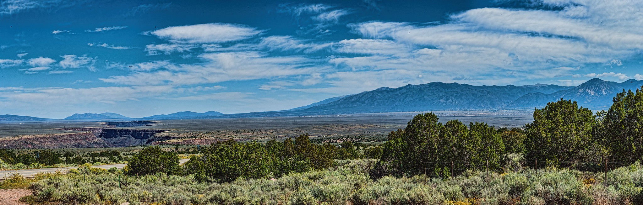 Taos New Mexico Panorama by Dave Hensley, CC 2.0 via Flicker